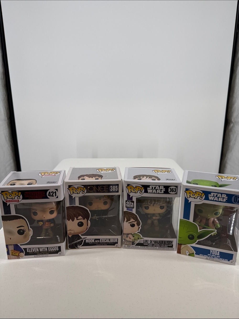 Funko Pop! Eleven with Eggos & Star Wars Luke Skywalker with Yoda Bundle